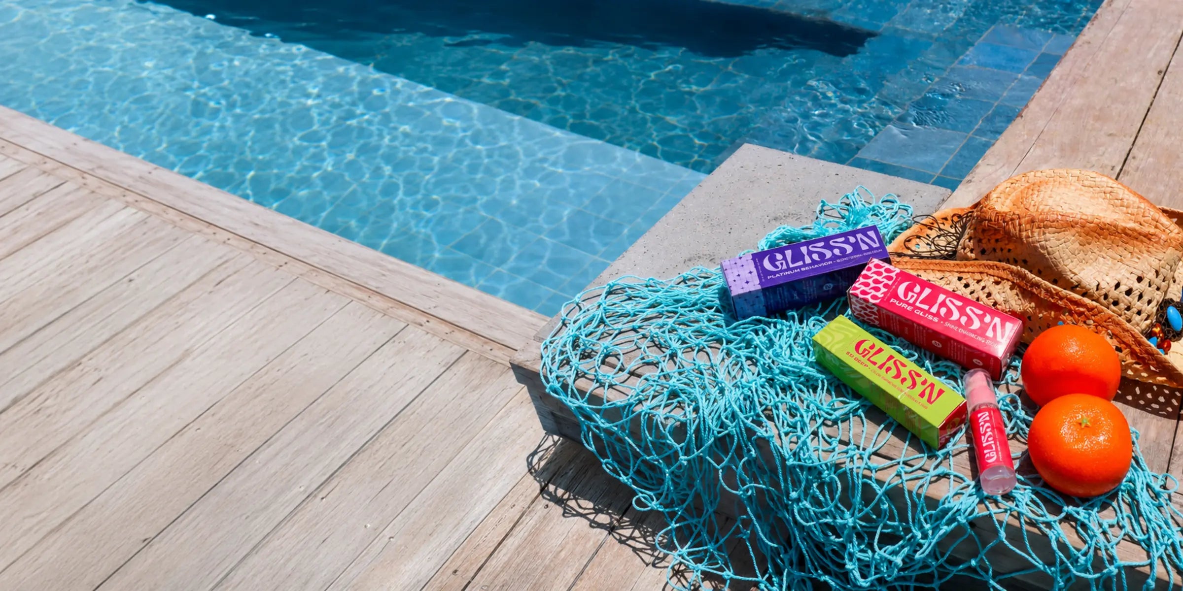 GLISS’N hair color and shine serums poolside